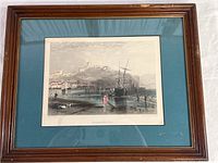 Full view of framed Scarborough print showing frame, mat, and artwork with visible wear.