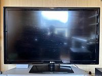 Front view of a black 41-inch LG flat-screen television.