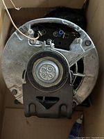 Top view of the motor showing General Electric logo on the end plate and mounting bracket.