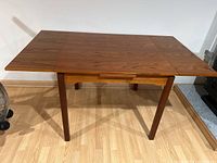 Front view of table with both leaves extended