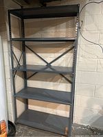 All-metal steel shelving unit with five shelves and cross-braced back, dark grey color.