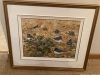 Frontal photo of original oil painting showing birds and violet plants in natural tones with frame visible