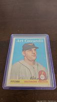 Front image of 1958 Topps Art Ceccarelli Rookie Baseball Card showing player portrait, team and position