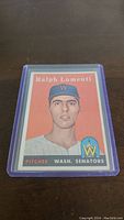 Front of 1958 Topps Ralph Lumenti Rookie Card featuring player portrait and team logo.