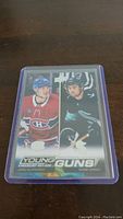 Front of Young Guns rookie hockey card showing Juraj Slafkovsky and Shane Wright.