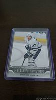 Front of Matthew Knies 2023-24 Upper Deck Series 1 Debut Dates rookie hockey card in protective sleeve.