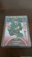 Front side of Riley Tufte Young Guns Canvas rookie hockey card depicting player in Dallas Stars uniform.