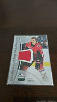 Front of Thomas Chabot 2019 NHL All-Star Skills Fabrics jersey card showing player image and fabric piece.