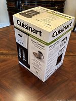 Closed retail box of Cuisinart Brew Central coffee maker, brushed metal series, displaying branding and product image.
