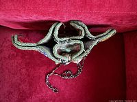 Top view of the multi-sided beaded bag showing the side panels and bead handles placement