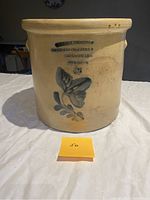 Front view showing maker's stamp and cobalt blue floral decoration