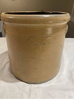 Front view of the 2 gallon crock showing the maker's mark embossed with text 'ST. HUMBERSTONE NEWTONBROOK' and number '2'