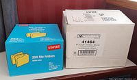 Box of 250 Staples brand manila file folders and box of 450 Quality Park 9x12 catalogue envelopes