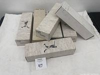 Photo of six white storage boxes labeled with years and brands: 1988 Donruss, 1989 Topps, 1990 Topps.