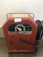 Front view of the Lincoln Electric AC 225 Amp arc welder showing control panel and amperage dial.