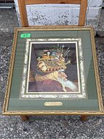 Framed artwork titled 'Old Man With A Lot On His Mind' showing detailed profile of an old man with multiple imaginative elements.