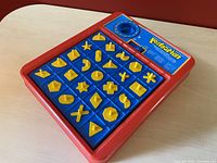 Complete Classic Perfection Game board with all yellow puzzle pieces set in place and timer visible.