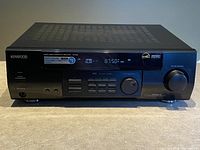 Front view of Kenwood VR-405 receiver showing brand, digital frequency display, and control buttons.