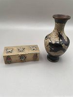 Photo of lacquered vase and enamel brass box showing overall condition and details