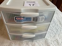 White Sterilite 3-drawer plastic storage unit with label showing size approx 7x8x7 inches.