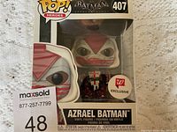 Front view of the boxed Azrael Batman Funko POP! figure showing the character design, box art, and exclusive strip.