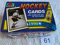 Blue box of 1990 Bowman Premier Edition hockey cards with player image on cover.
