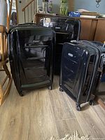Front view of all three suitcases displayed side by side
