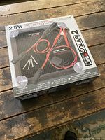 Box of Battery Life+ Solar 2 2.5W solar battery charger and maintainer showing solar panel and battery clamps.