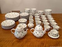 overview of tea and coffee service laid out on table