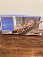 Original packaging box showing BabyBjörn branding and bouncer model.