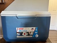 Front view of the Coleman Xtreme 70-quart cooler showing branding and label.