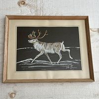 Full view of the framed caribou painting described as vintage artwork by Joan Stephens.