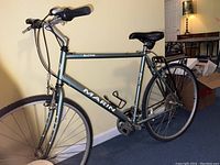 Full side view of the Marin mountain bike showing frame, tires, seat, handlebars, and rear rack.