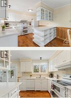 Kitchen interior photo showing white cabinets installed in a classic layout with glass doors and solid doors, countertop and appliances visible.