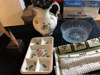 Full view of all items in the lot including ceramic pitcher, glass bowl, ceramic tray, wooden match holder, and calendar