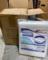Box of 6 packs clearly showing packaging details and contents description of queen mattress bags from StarPlastix.