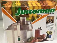 Box of Juiceman Automatic Juice Extractor showing the product image and branding.