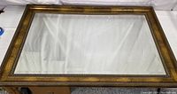 Full view of large rectangular framed mirror showing overall size and condition