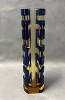 Front view of a 10-inch tall cylindrical vase showing cobalt blue and amber geometric patterns with a glossy finish.