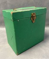 Green Armit Platterpak storage case closed showing minor wear and metal latch
