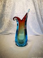 Front view of the vase showing its teardrop shape and color gradient