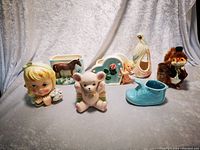Photo of seven assorted flower arranging vases in a soft light setup