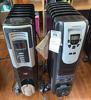 Front view of two heaters showing control panels and brand labels. Bonaire heater on the left, Kenwood heater on the right.