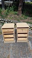 Both wooden side tables shown with three drawers each, one missing top drawer front.