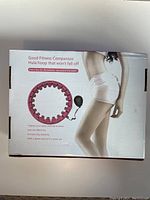 Box of Good Fitness Companion hula hoop with promotional photo showing use on waist and highlighting features.
