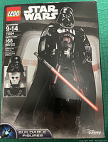 Box front showing LEGO Star Wars Darth Vader buildable figure set 75534, 168 pcs, for ages 9-14. The box is opened.