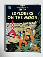 Cover of 'Explorers on the Moon' featuring astronauts and lunar landscape.