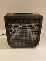 Front view of Traynor Studio Mate 10 amplifier showing logo and general condition.