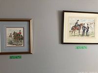 Photo showing two framed prints: left print measuring approximately 15x16 inches depicting two soldiers with two horses and signed C.P.P. Lawson, right print measuring approximately 20x16 inches depicting three soldiers near camp tents.