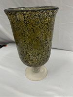 Green Partylite Siena Lights hurricane candle holder showing crackle gold mosaic finish and clear pedestal foot.